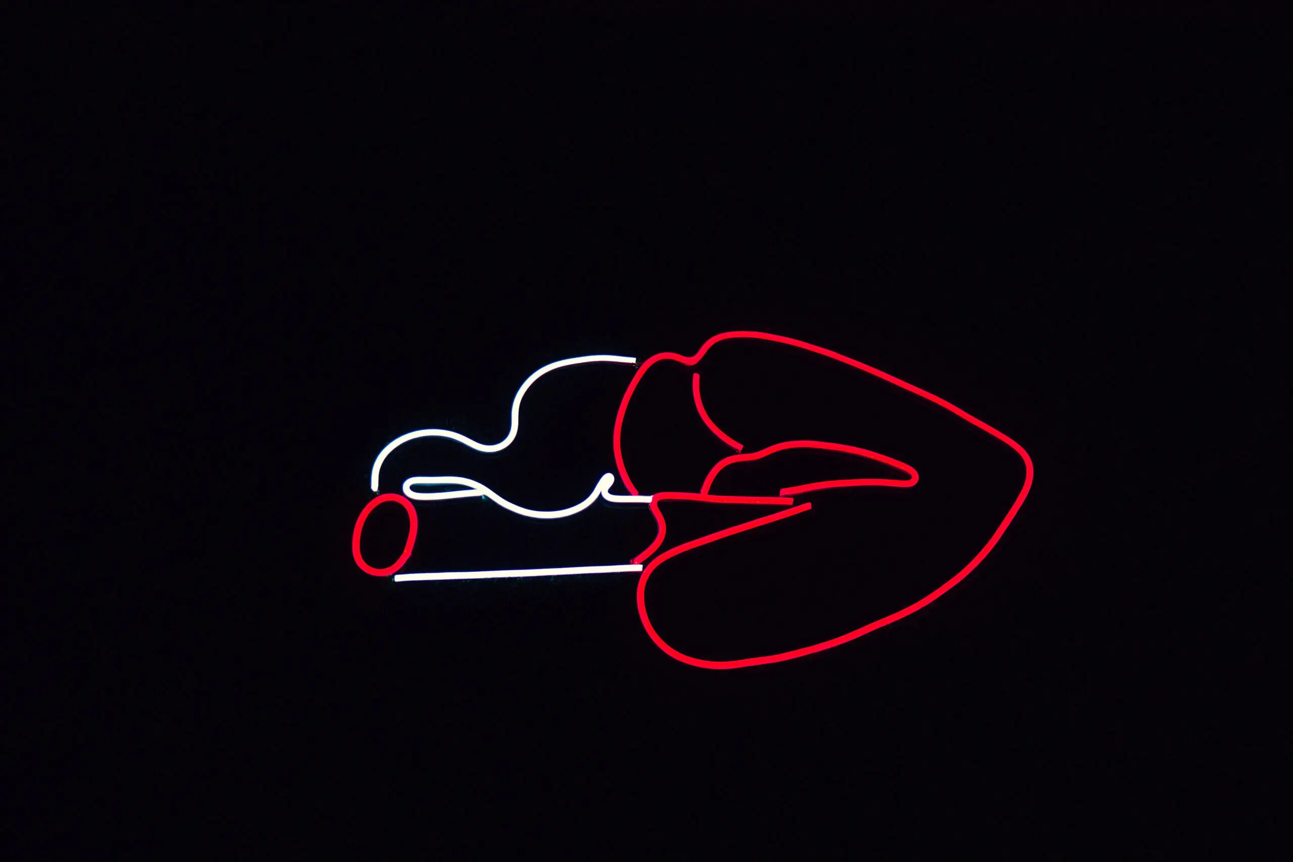A stylised pair of lips holding a cigarette