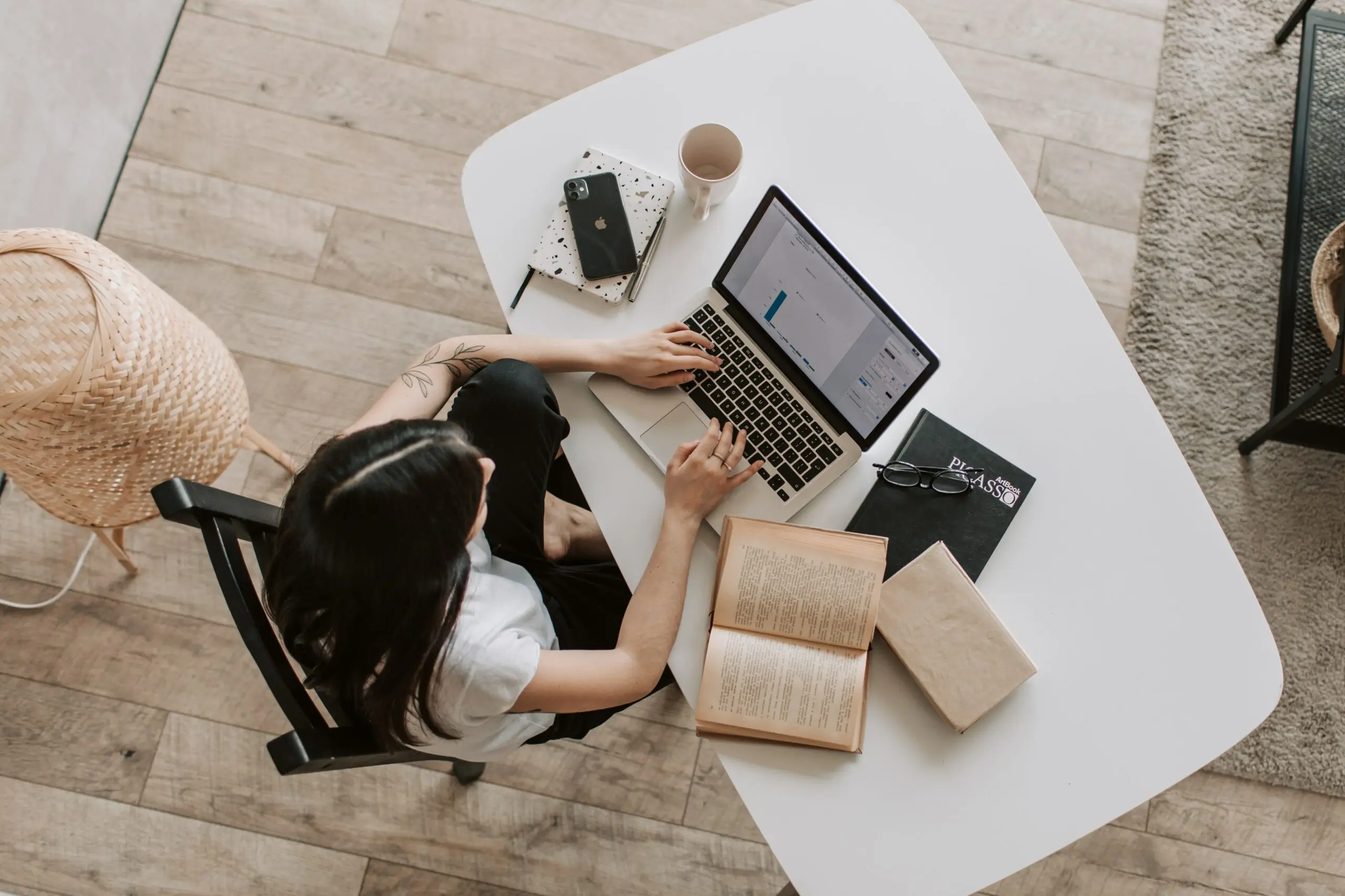 A top down view of someone using a laptop
