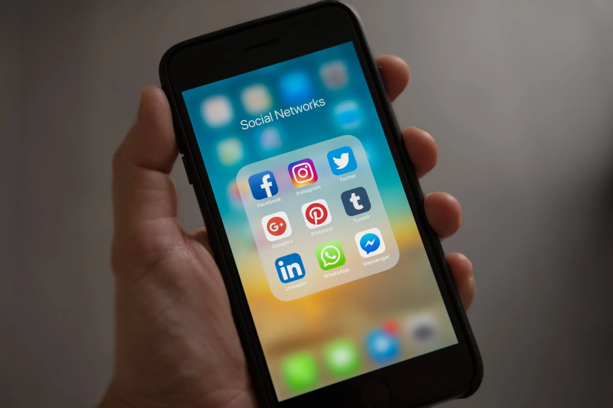 A phone, showing nine social media apps