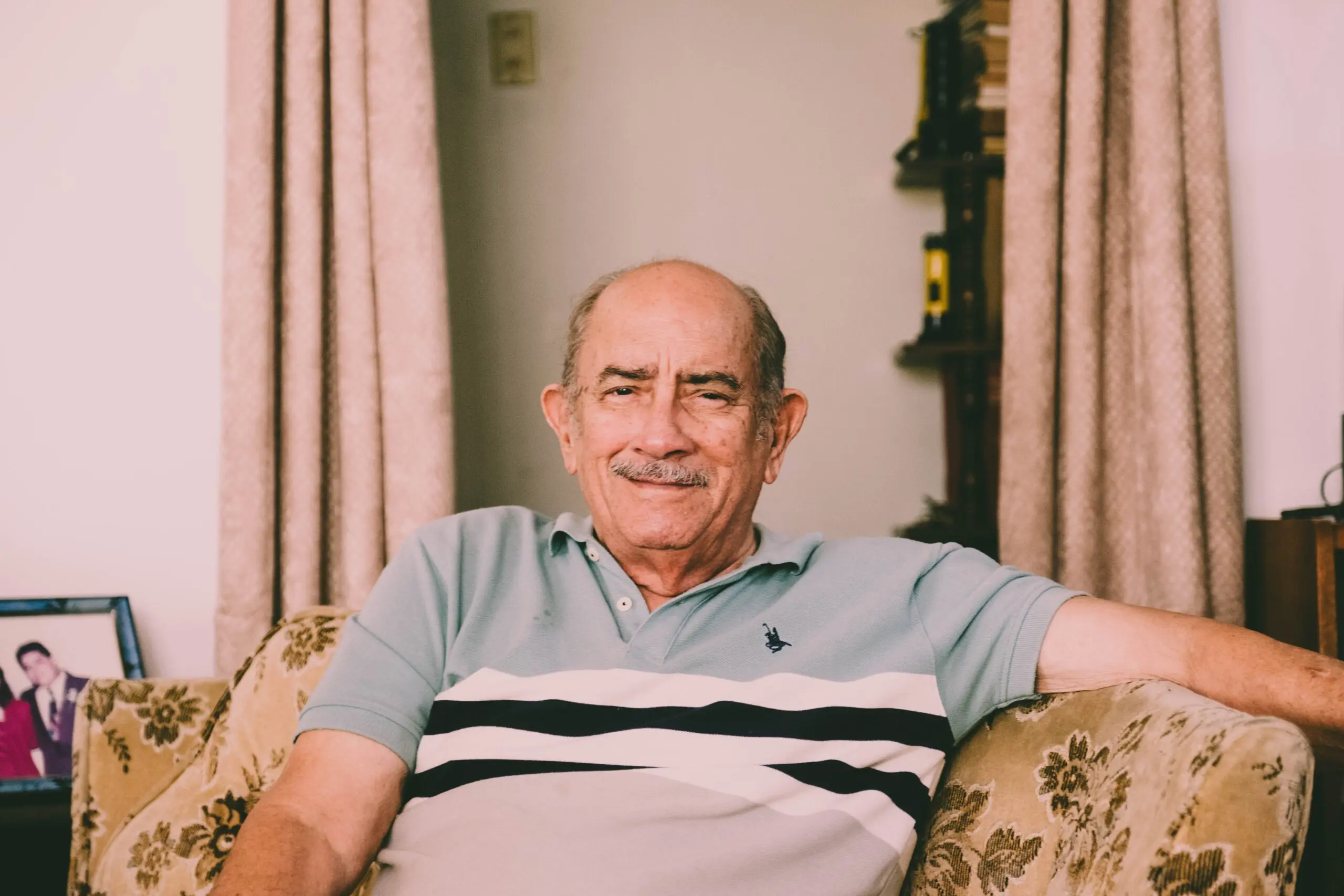 A man smiling at the camera