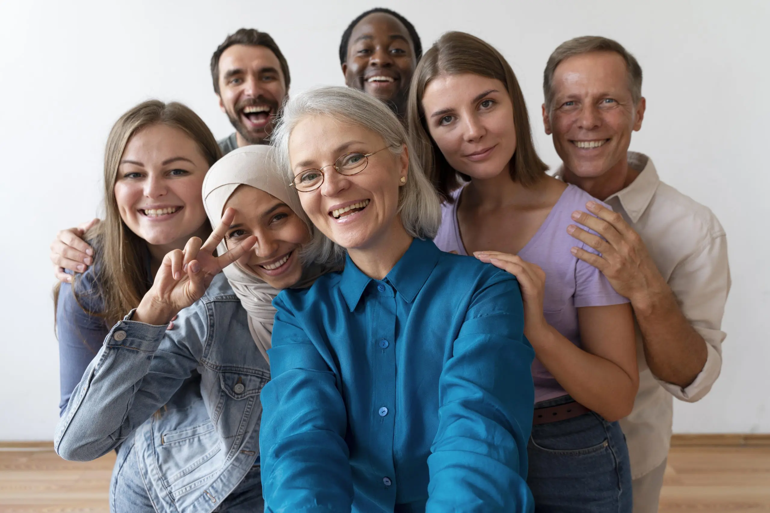 diverse-group-of-people-taking-selfie-together