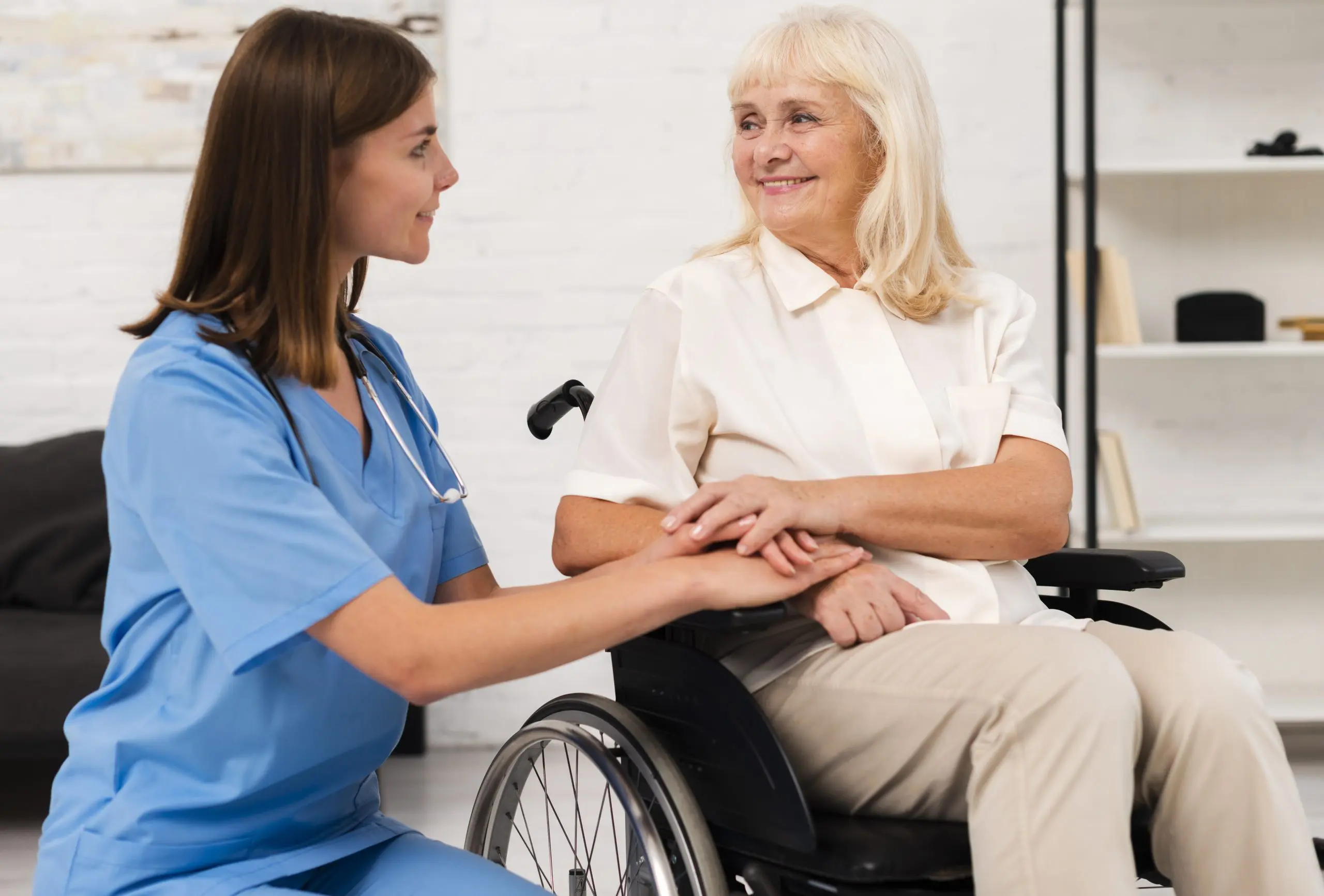 caregiver-taking-care-woman-wheelchair