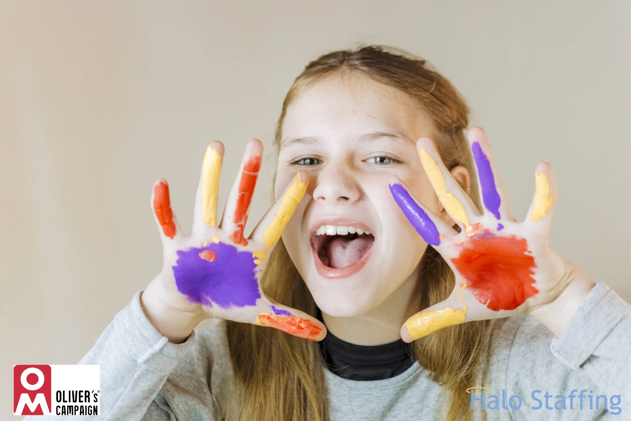 girl with autism with paint on hands