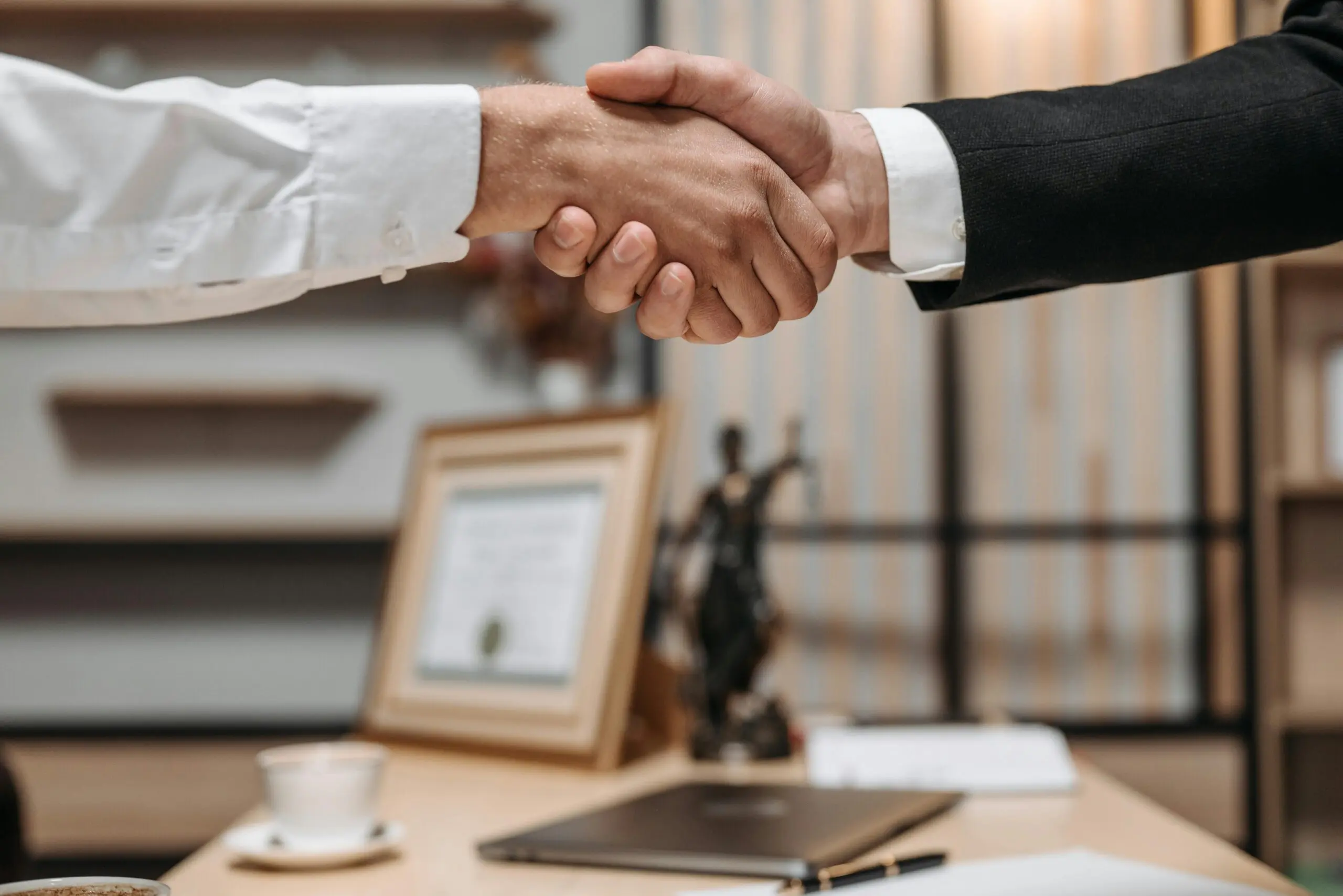 people-taking-part-in-a-handshake