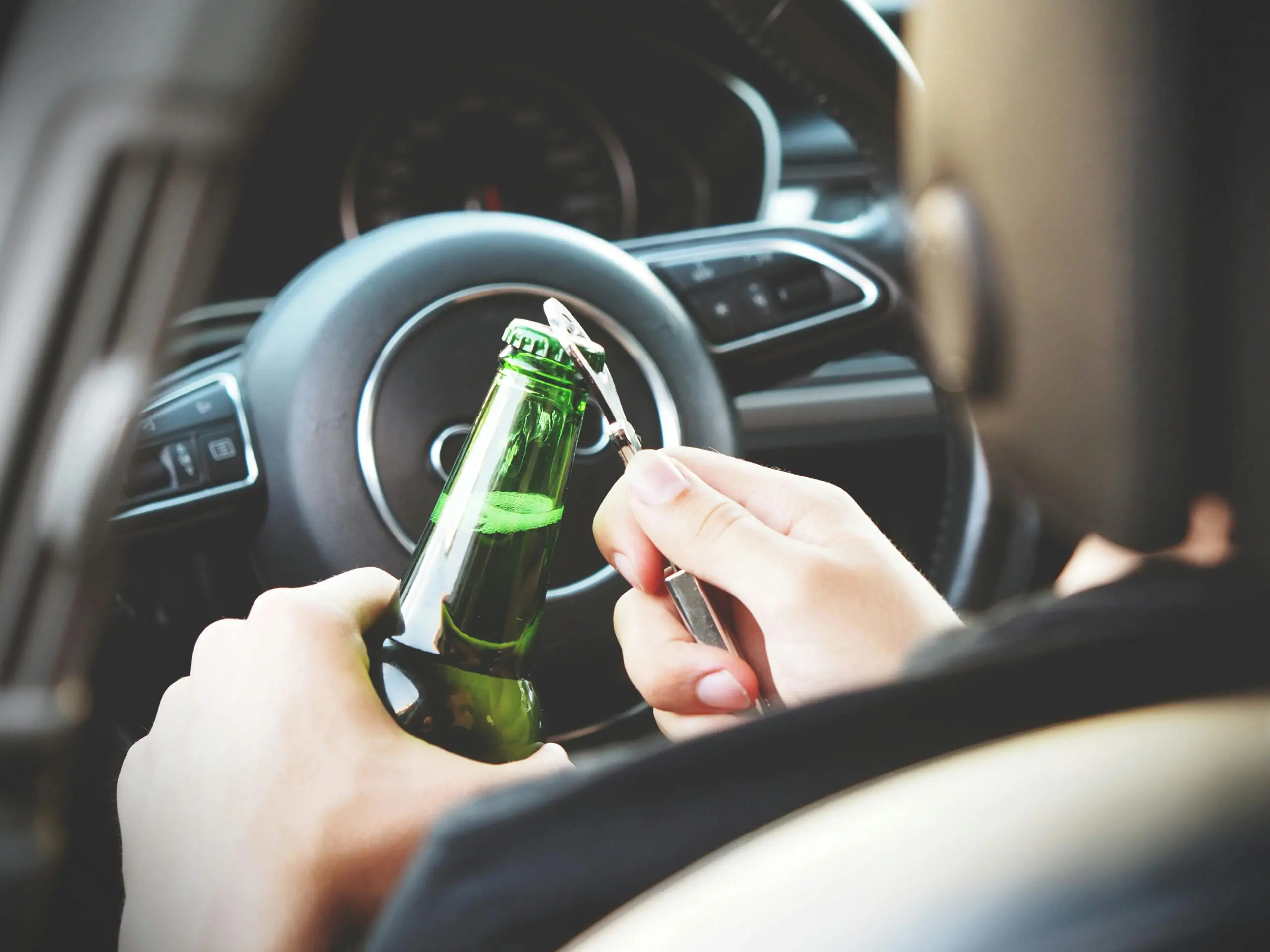 someone-drinking-behind-the-wheel