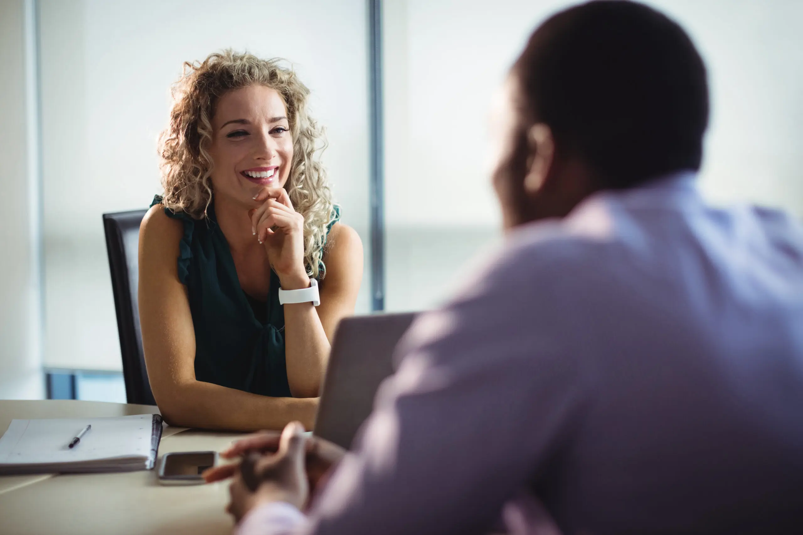 Workers interacting with each other in office