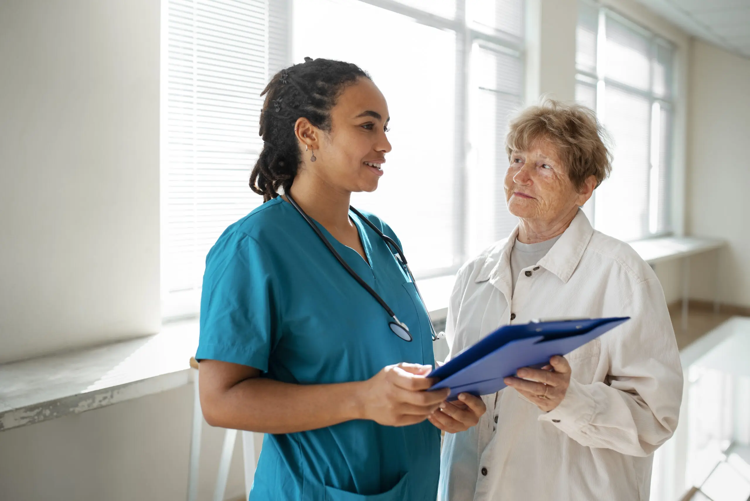 smiley support worker with patient