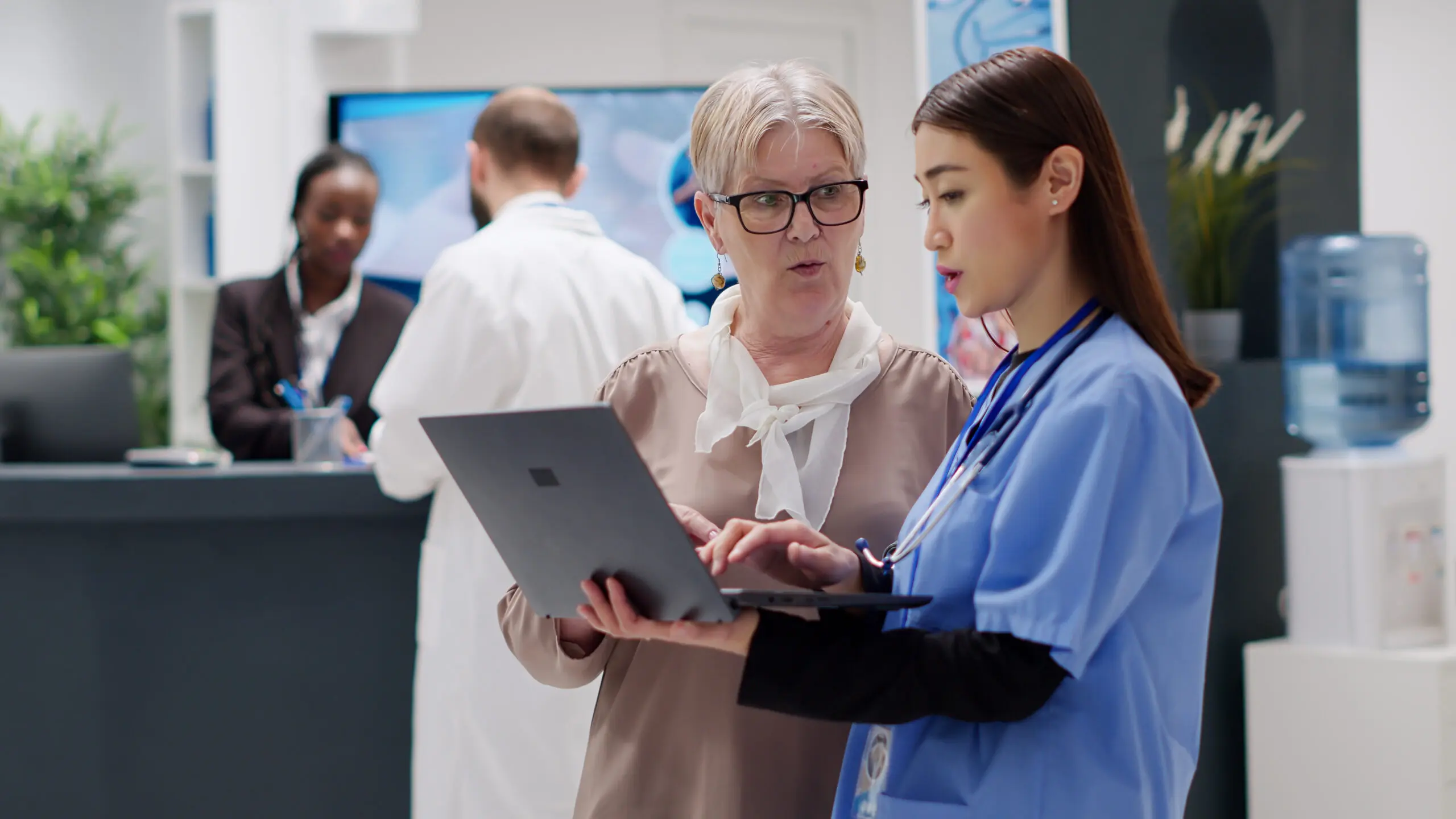 agency staff talking to and caring for individual organisation is supporting