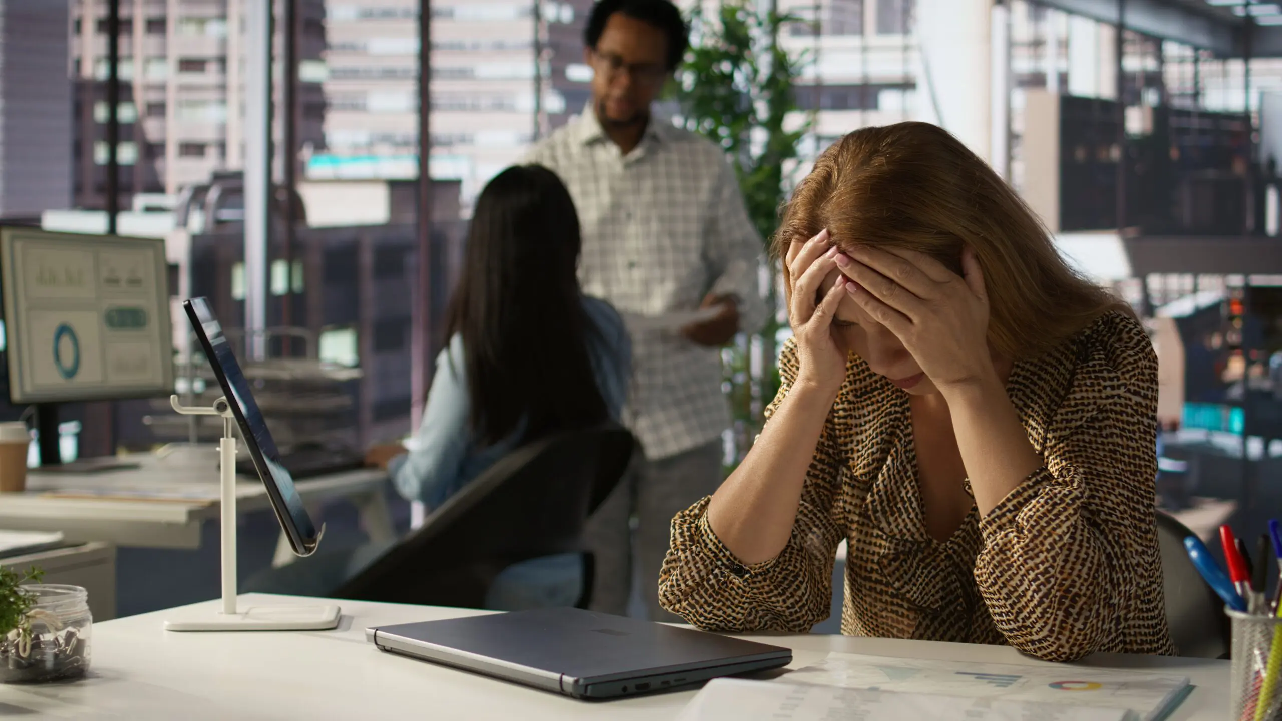 staff member who has started to become disengaged from work and colleagues