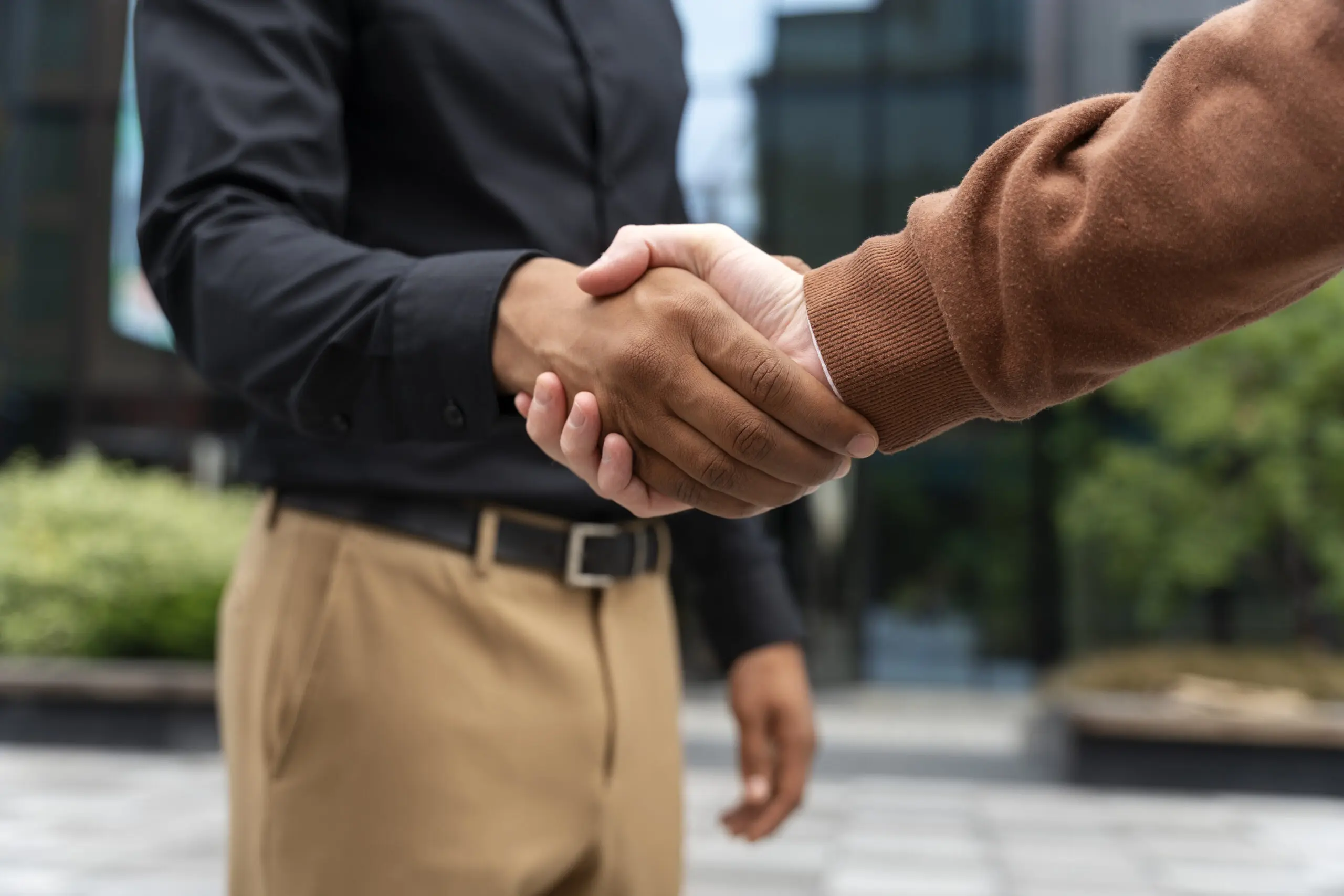 two men in a handshake