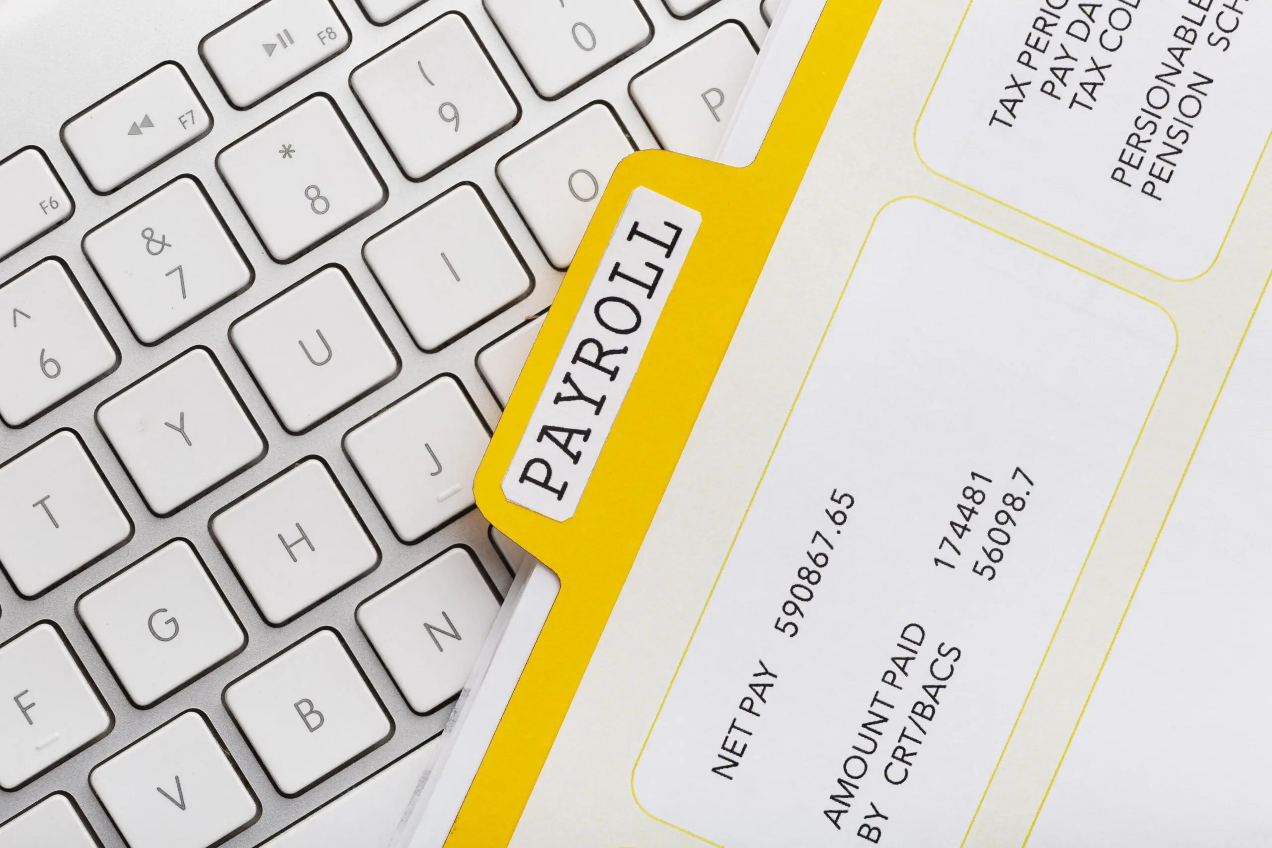 top-view-payroll-concept-with-keyboard