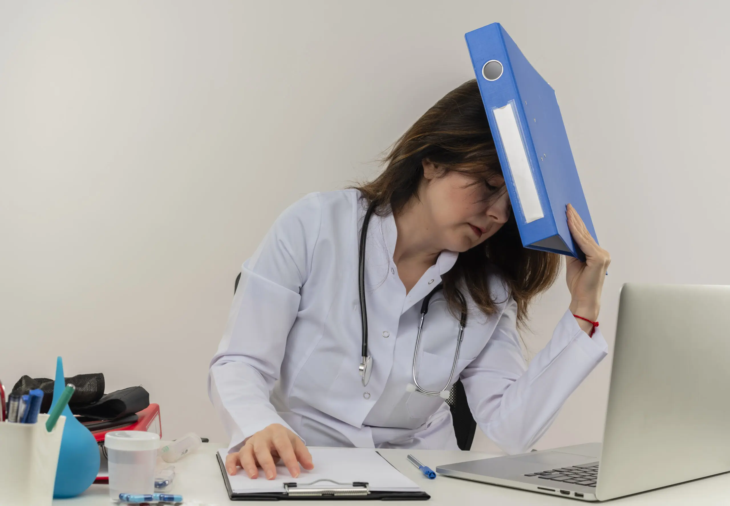 nurse who is stressed due to the problems happening around her
