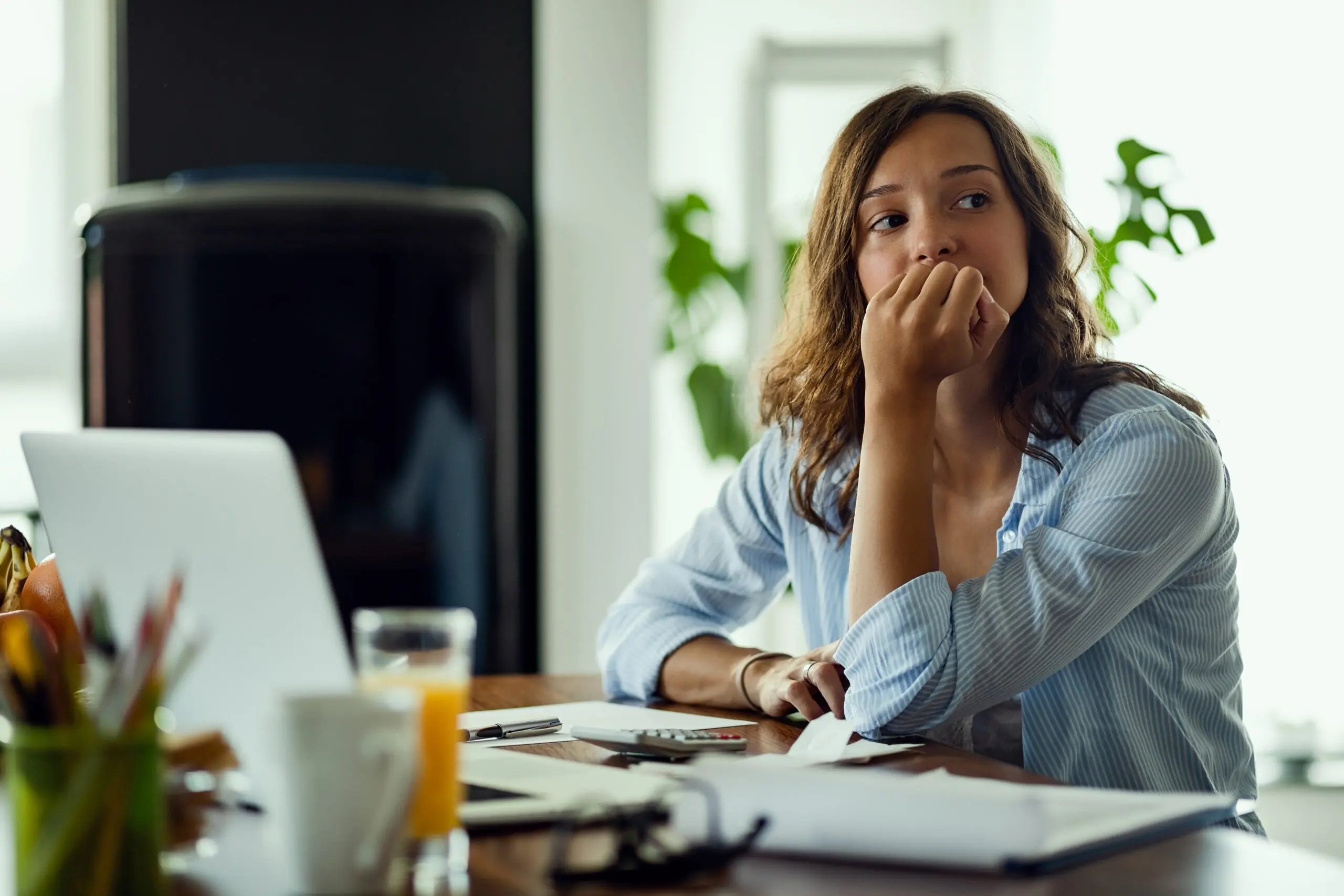 young woman who feels worried about concerns that are not being raised
