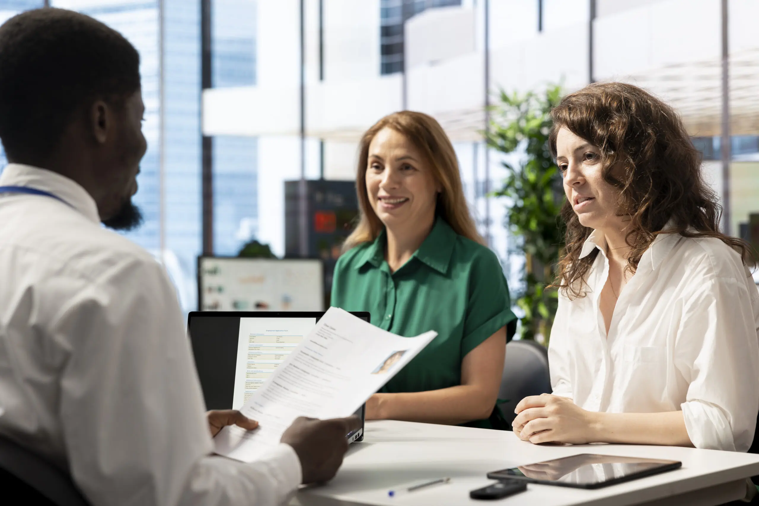 managers interviewing new job applicant