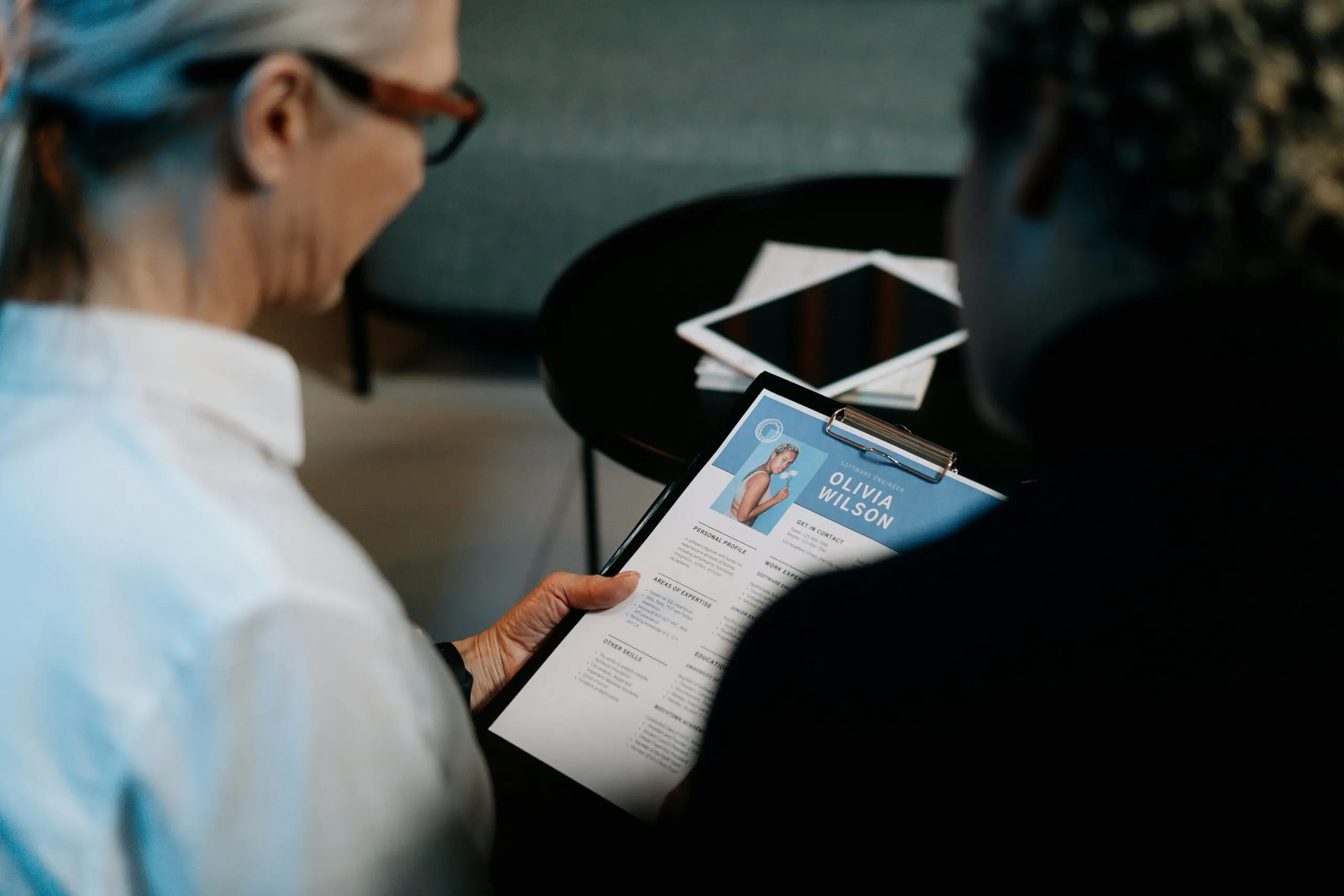employer looking at a cv of a potential candidate