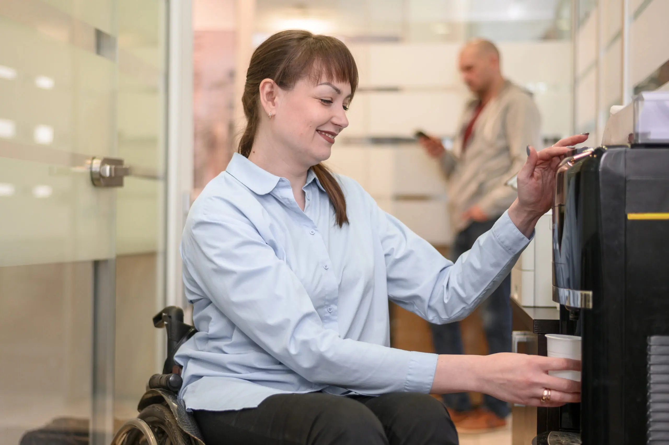 confident-businesswoman-wheelchair-pouring-water