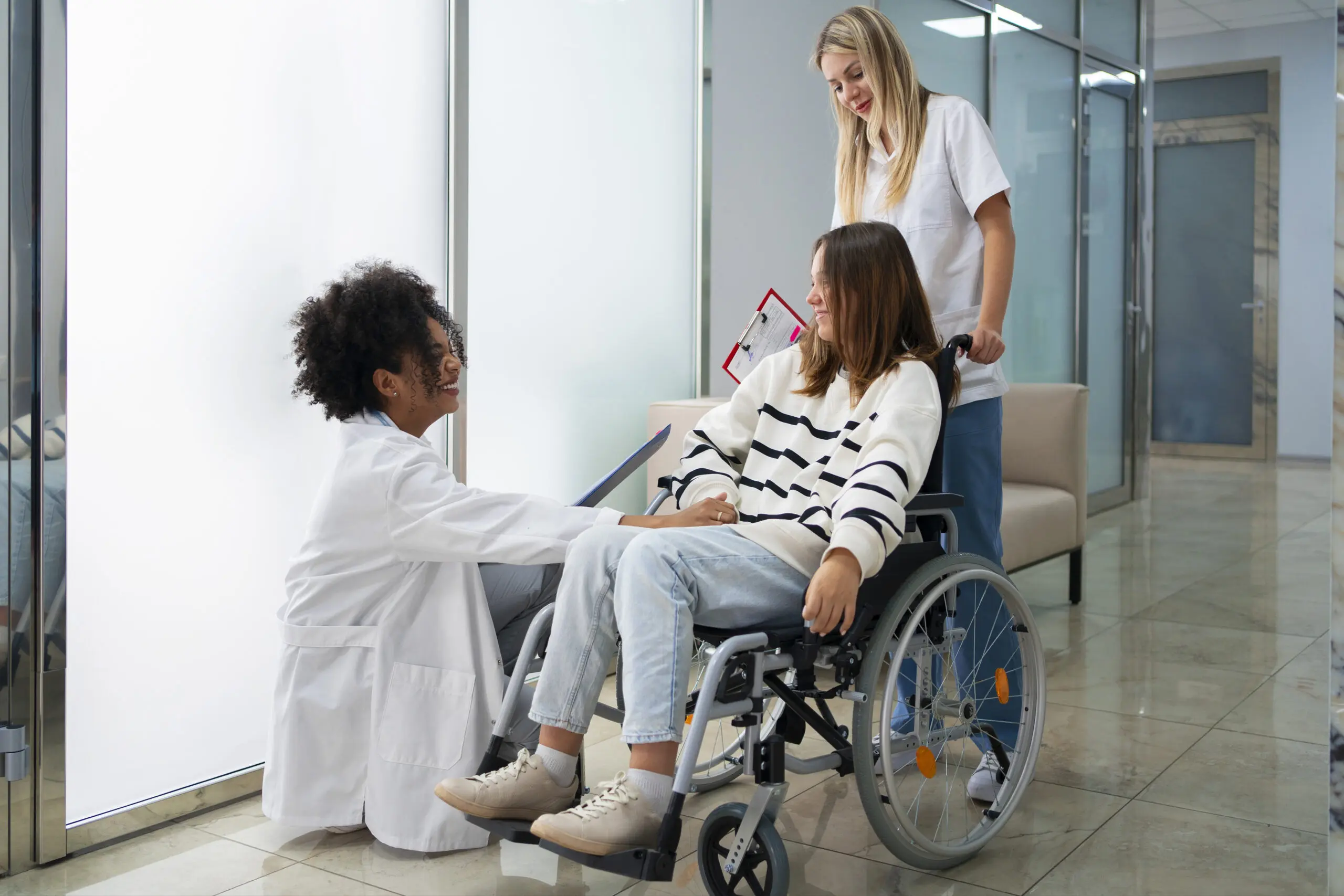 female support worker assisting patient