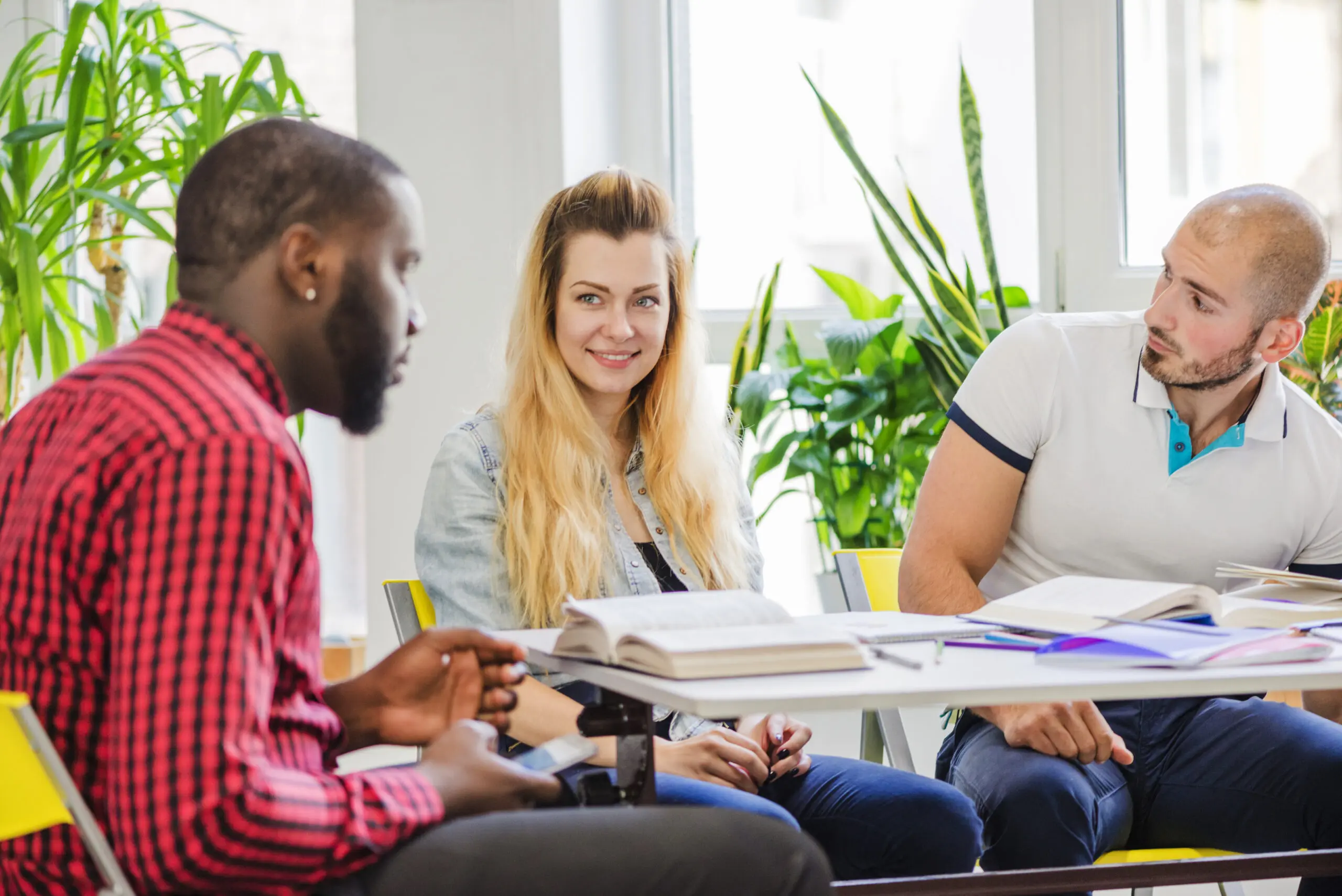 young diverse group of support workers attending a training session