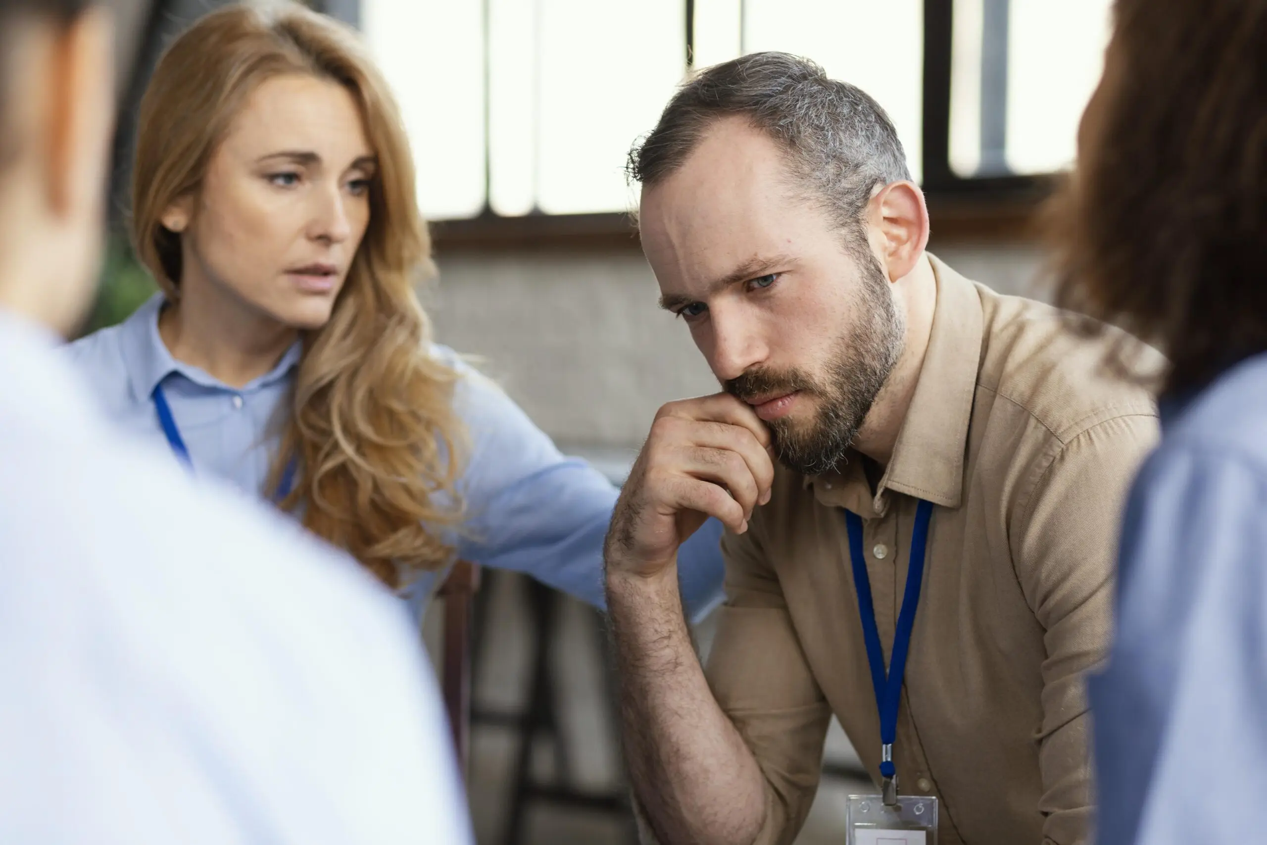 close up of sad manager, halo staffing supporting him