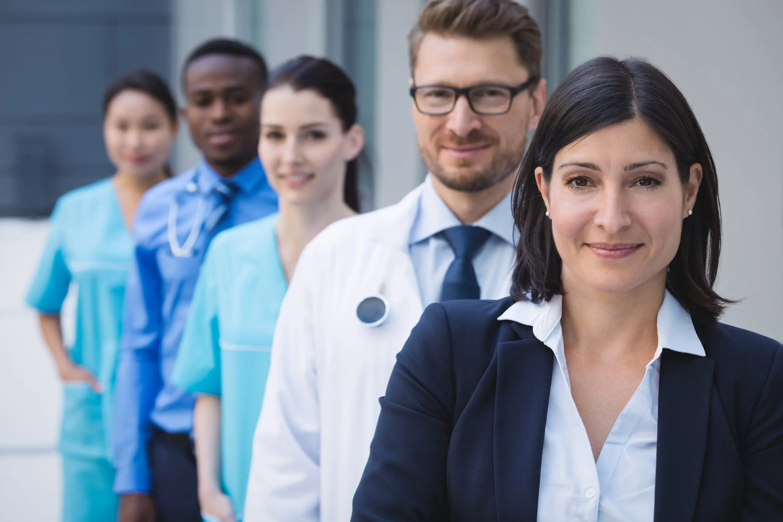 team of support workers standing in a role