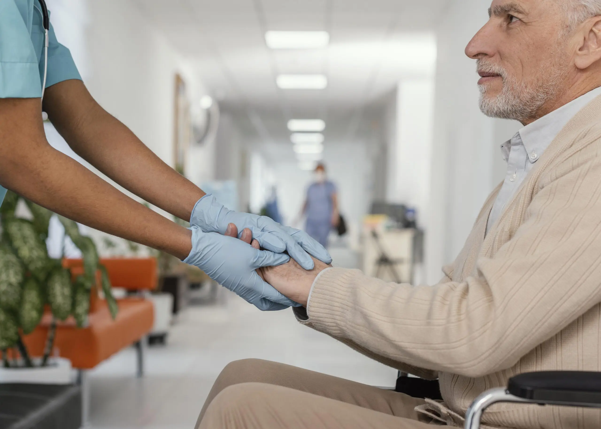 close-up-health-worker-helping-patient