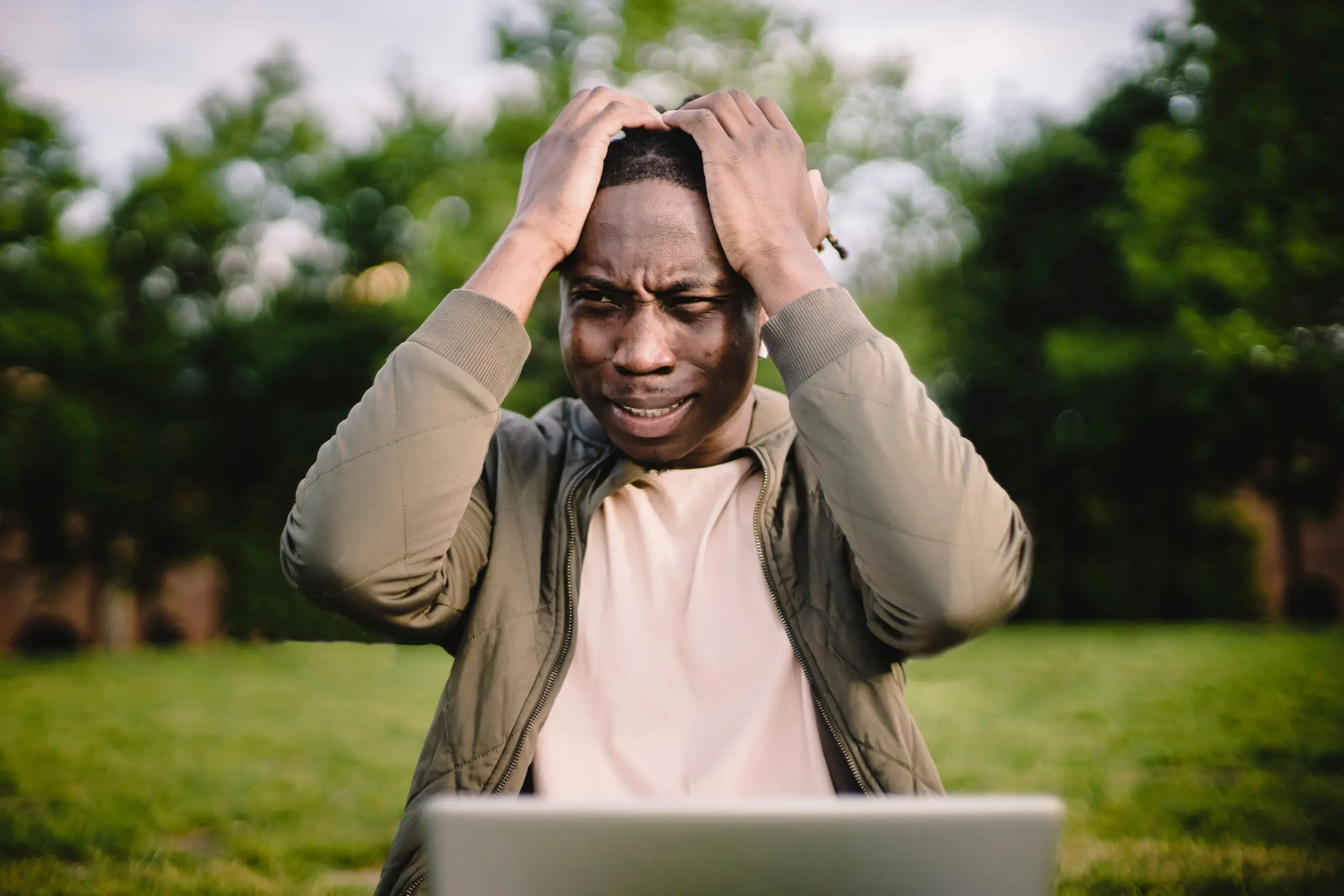 disappointed and sad black man who is unable to apply for your job due to unseen inaccessibility in your application form