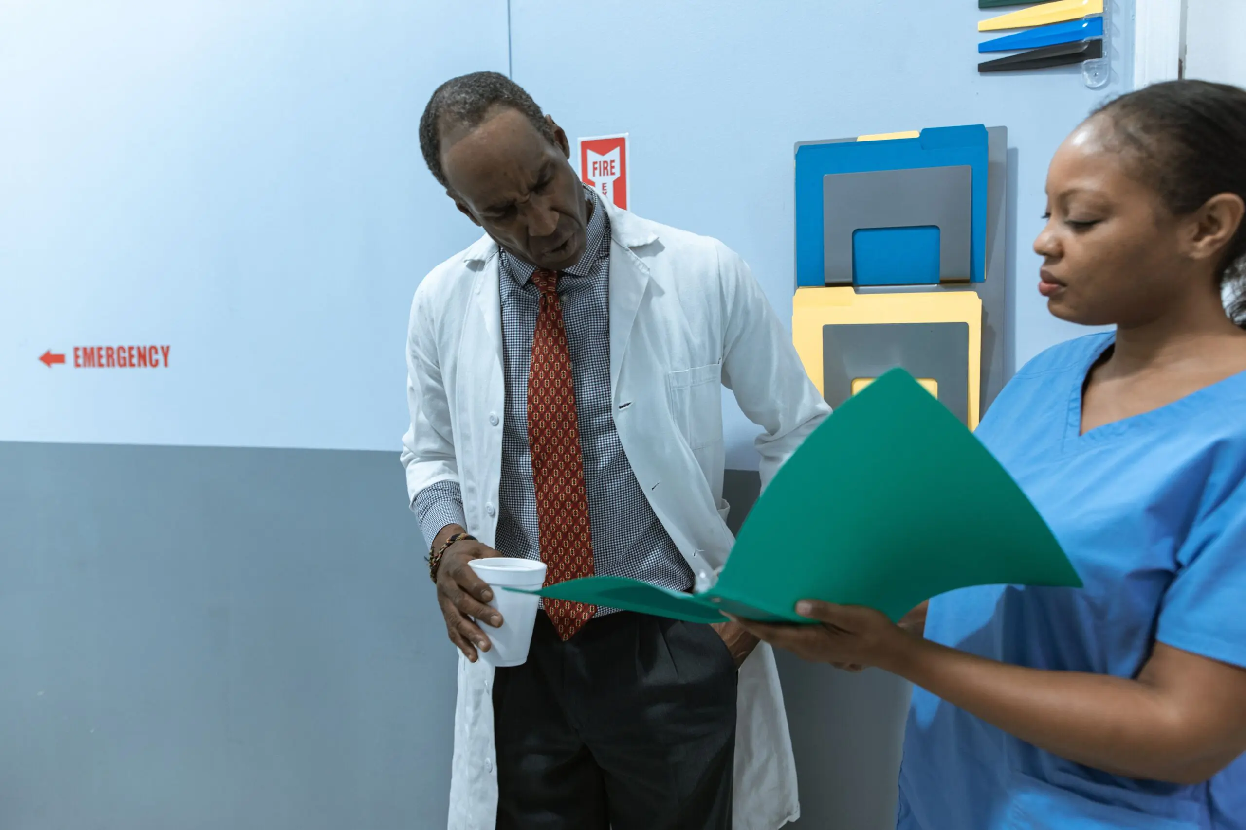 stressed care manager looking at the rota with unfilled shifts on a busy day